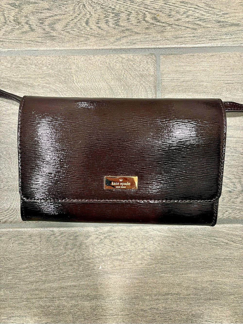 kate spade Glossy Crossbody Bag in Brown
